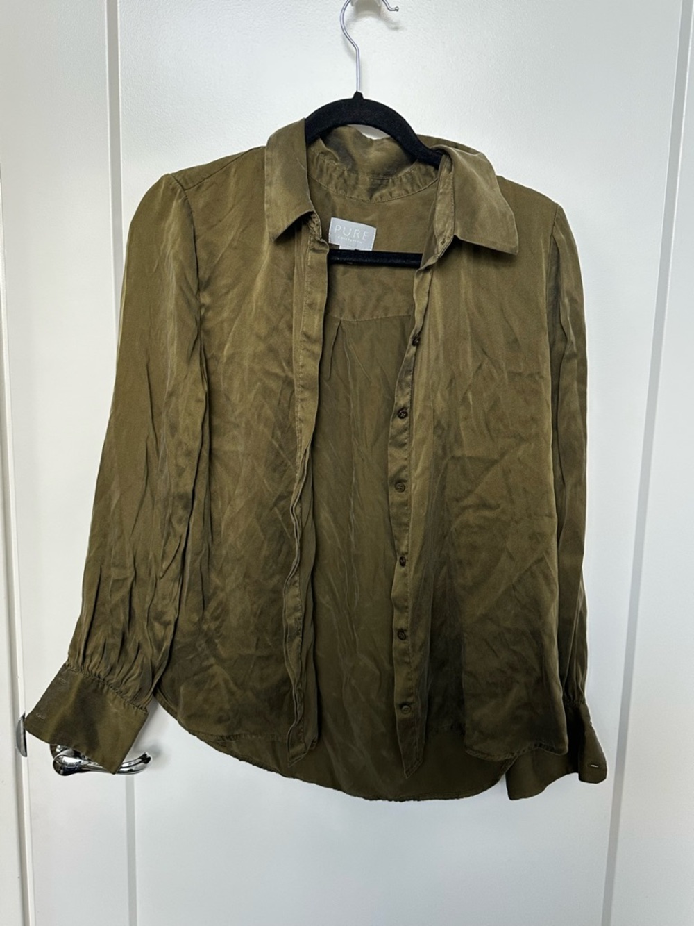 Pure Collection Olive Green Garment Label Detail